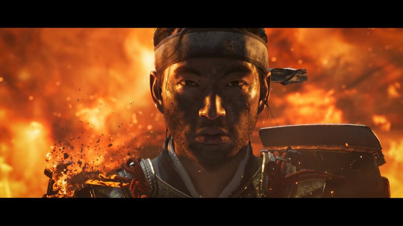 Jin circondato dalle fiamme in un'immagine promozionale di Ghost of Tsushima