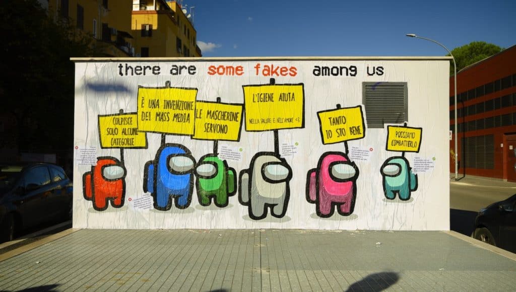 Un graffiti che rappresenta alcuni commenti tipici sulla pandemia di COVID sotto forma di meme
