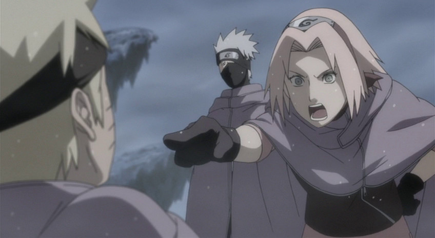 Naruto, Kakashi e Sakura mentre rimprovera Naruto