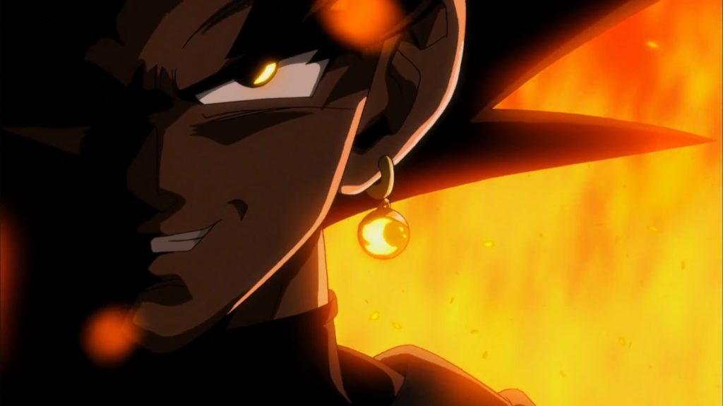 Black Goku avvolto dalle fiamme si avvicina verso lo spettatore