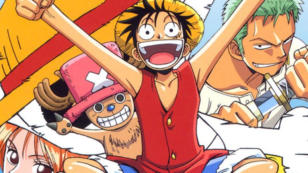 Rufy sorride davanti allo schermo, con alle spalle Zoro, Nami e Chopper, alcuni membri della ciurma Cappello di Paglia